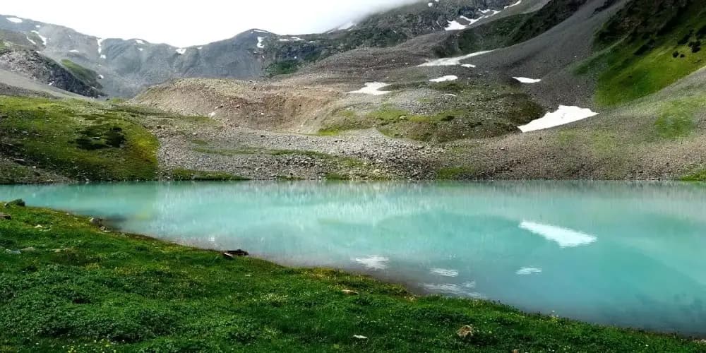 Discover the Beauty and Serenity of Shukargah Lake in Pakistan